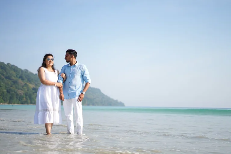 Guests enjoying the clear water during an Andaman beach holiday