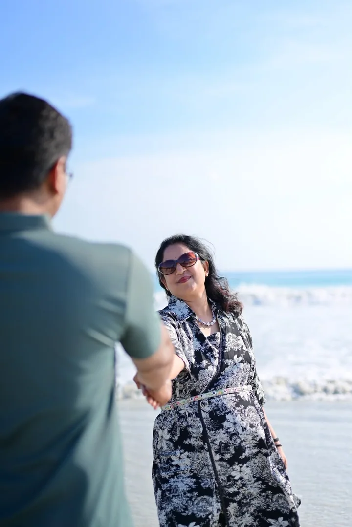 A couple sharing a playful moment during their Andaman beach trip