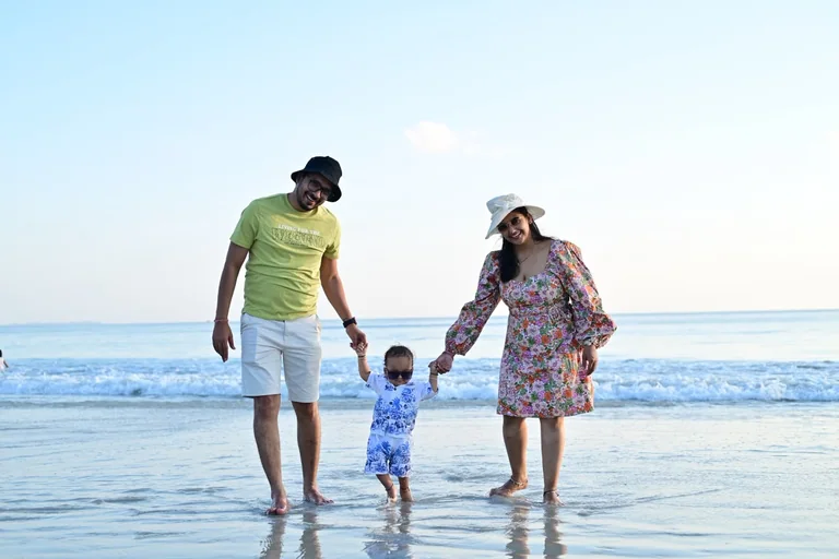 A family with a young child enjoying an Andaman beach