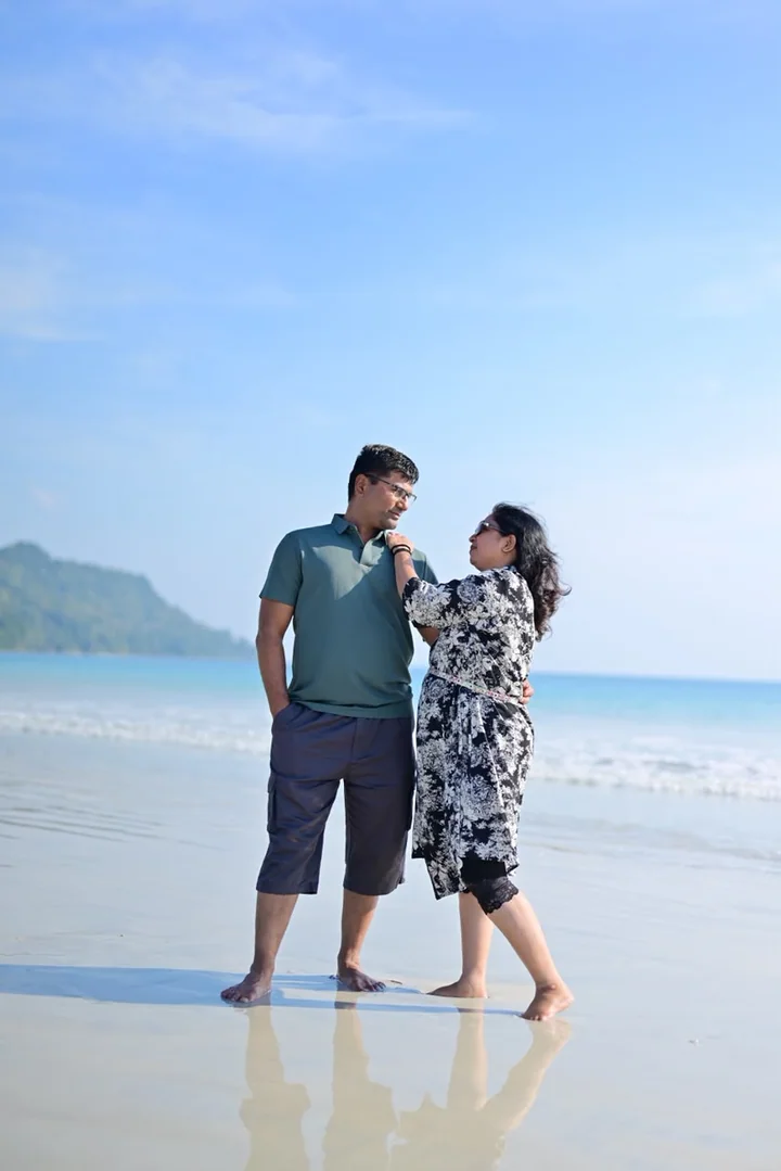 A couple smiling together during their Andaman beach holiday