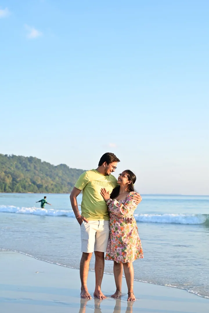 A couple sharing a relaxed moment on an Andaman beach