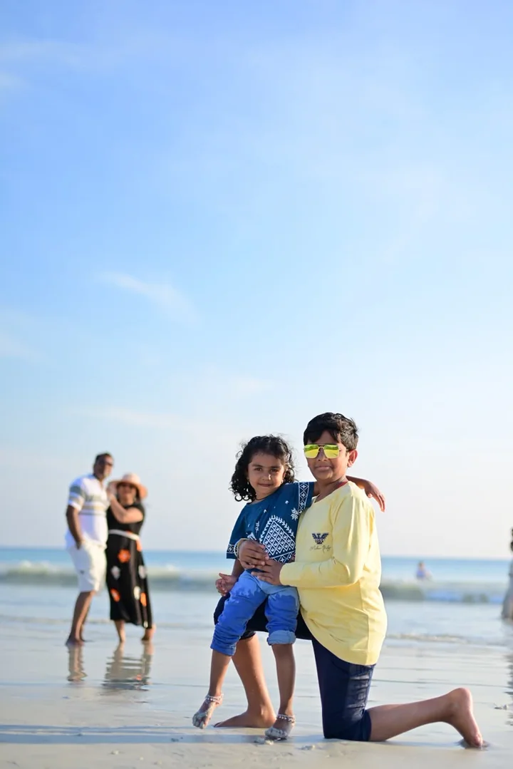 Children enjoying a cheerful day together on the beach