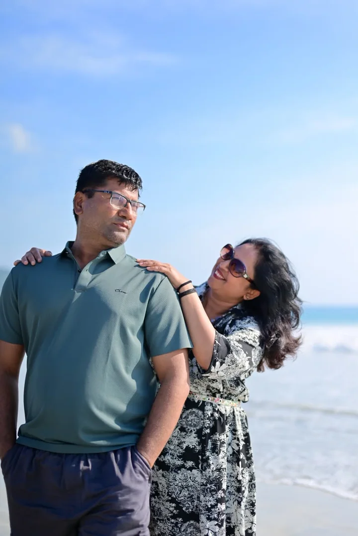 A couple posing together beside an Andaman beach